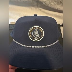 Melin Coronado Navy Anchored in Quality Logo